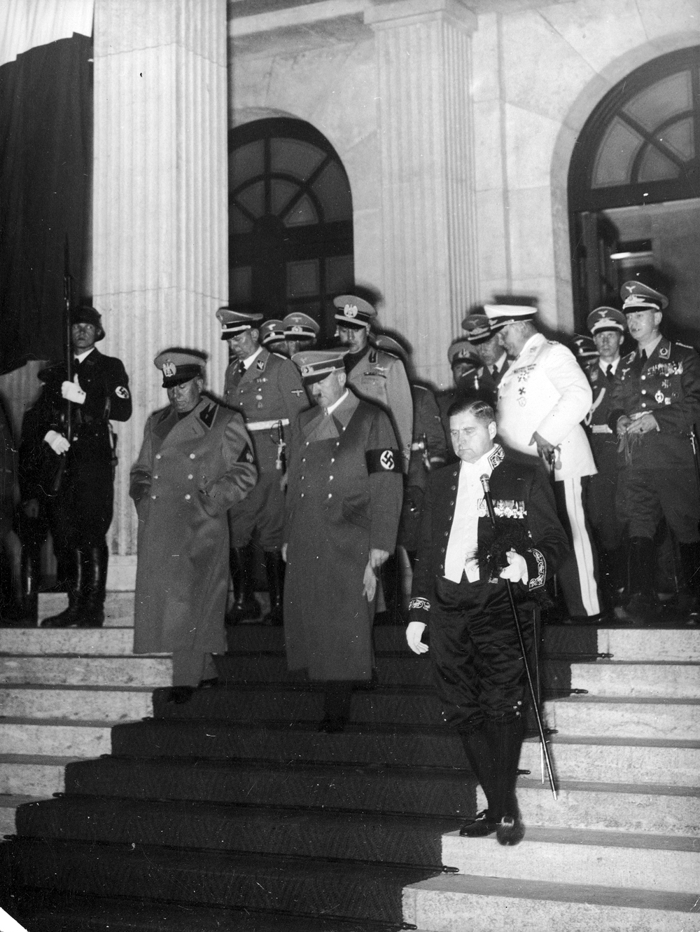 Adolf Hitler and Benito Mussolini leave the Führerbau after the signature of the Munich Agreement